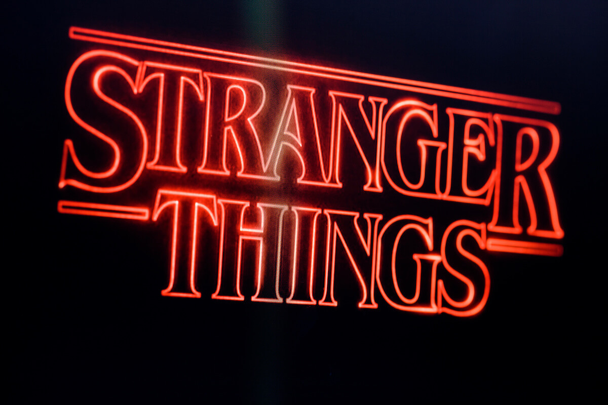 Stranger things title logo photographed on a computer screen.