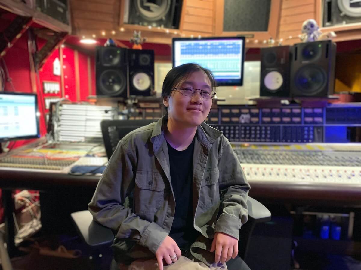 Asian girl in an audio studio