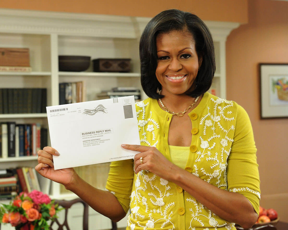Washington, DC, USA-First Lady Michelle Obama prepares her absentee ballot for the upcoming elections. 