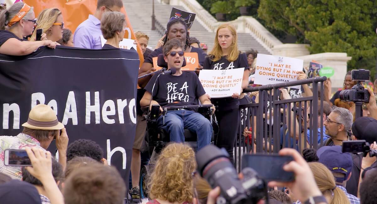 Activist Ady Barkan leads a rally for healthcare reform, shown in the documentary Not Going Quietly.  