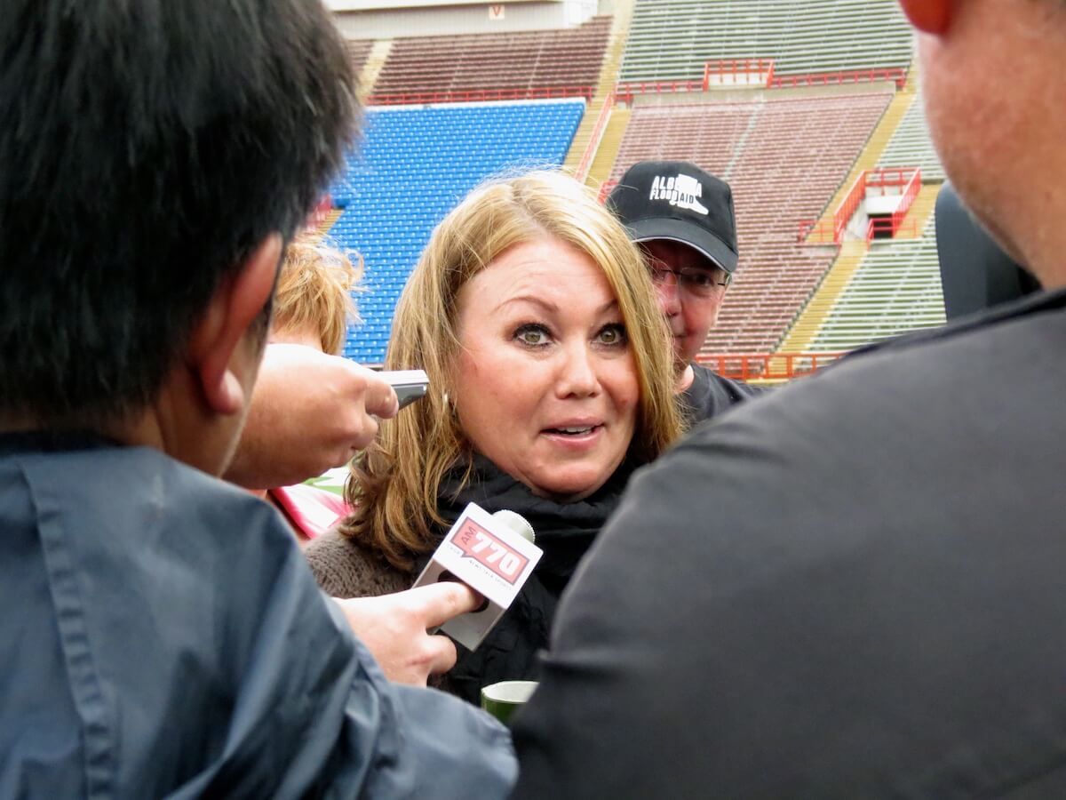 Jann Arden talking to media.