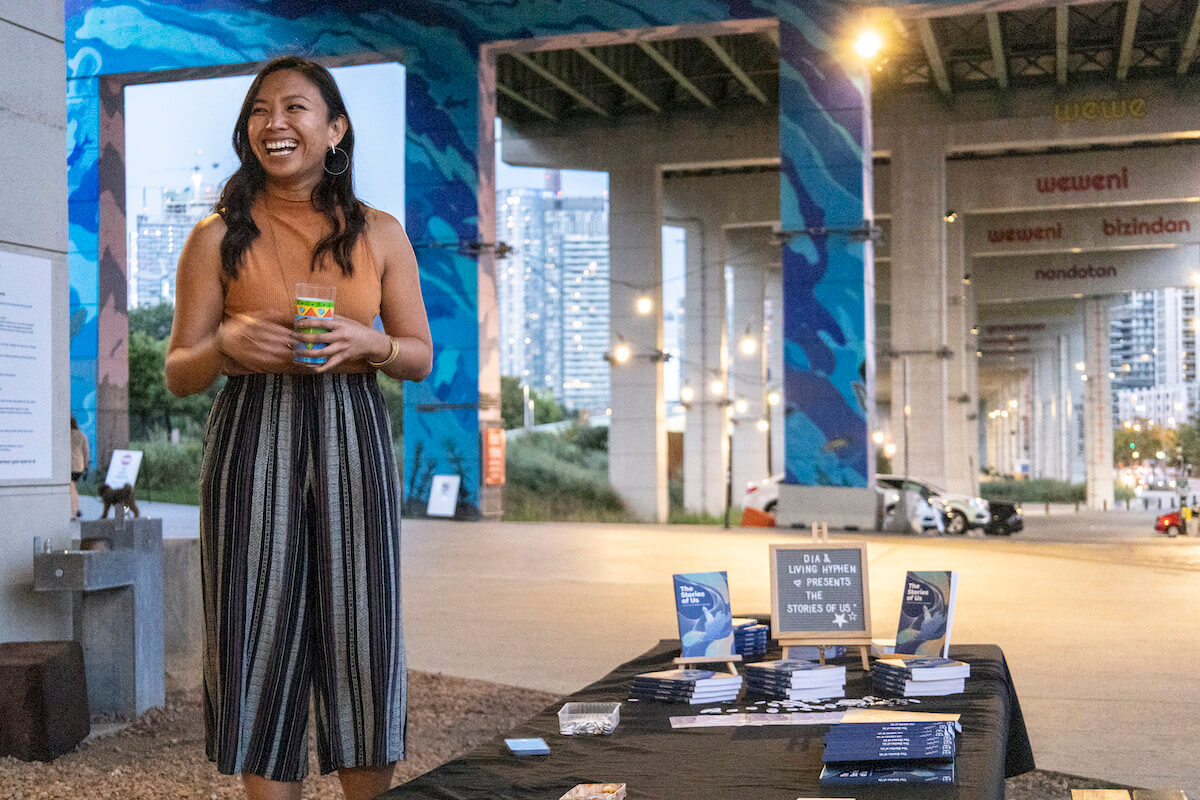 Justine Abigail Yu, the founder of Living Hyphen, is pictured at the launch of The Stories of Us at The Bentway in Toronto on Sept. 15th, 2022.