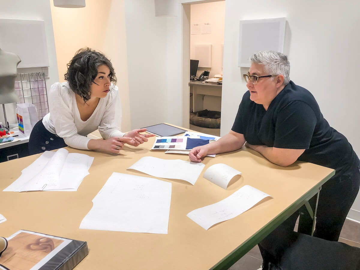 Co-founders Megan Szanik (left) and Carol Palynchuk (right) making plans for Letters Apparel, a gender-neutral clothing company. 