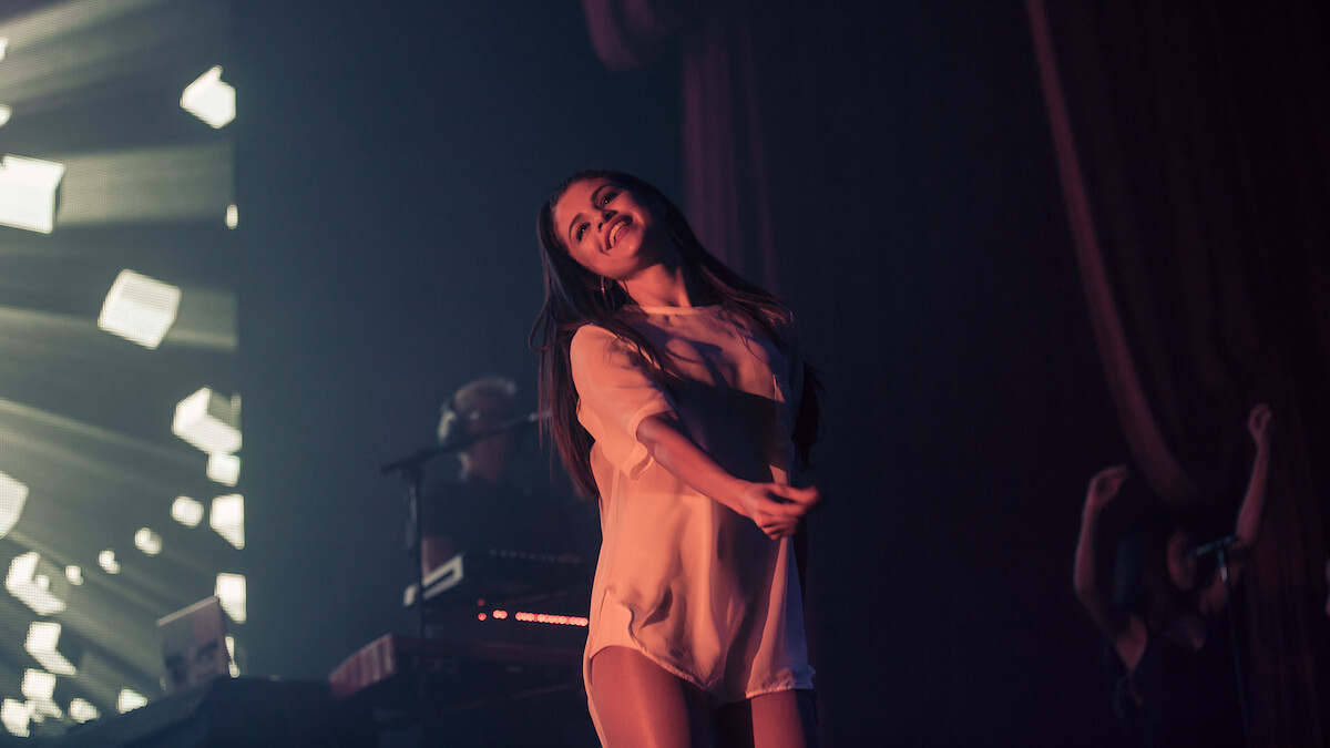 Selena Gomez performing on stage.